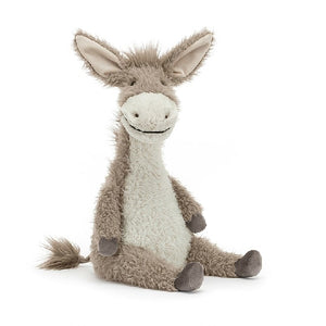 adorably soft plushie of a smiling donkey by popular brand Jellycat.